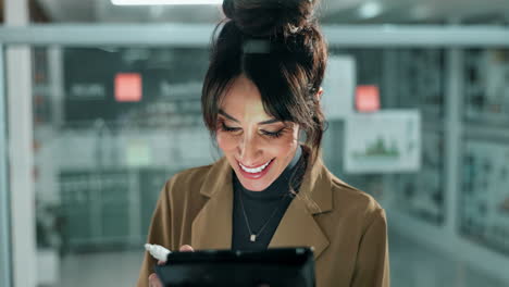 woman working on tablet in office