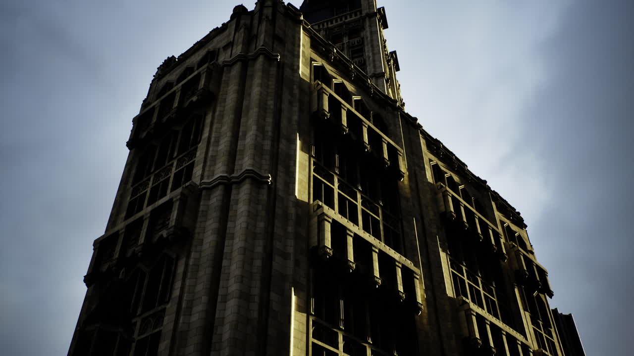 Historic building under dramatic sky during late afternoon light