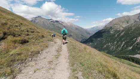 hikers on mountain trail