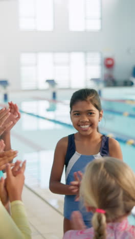 young swim team celebrating success