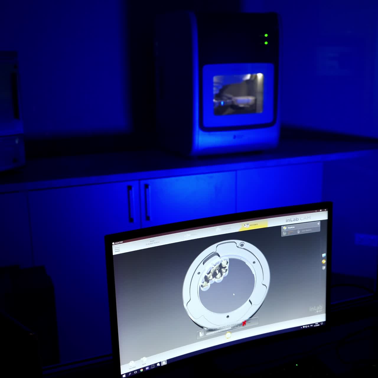 Dental technician making dental crown