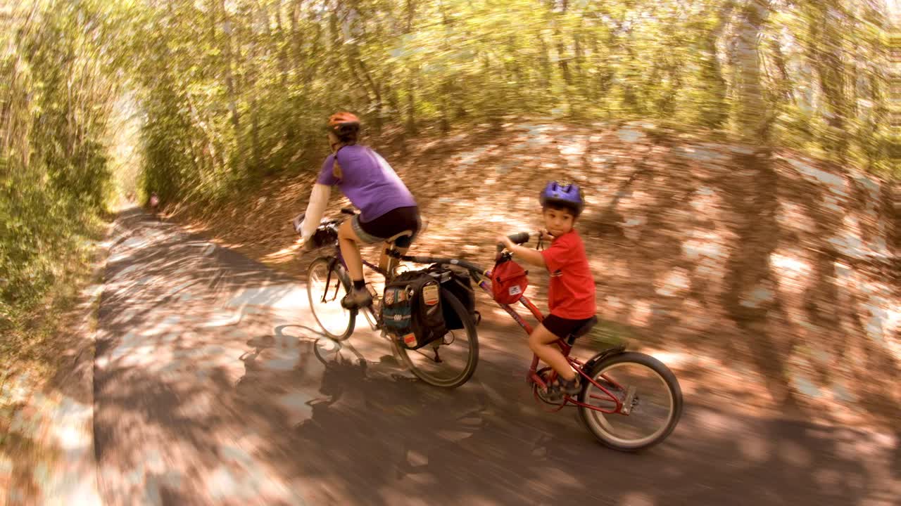 Family biking on a trail