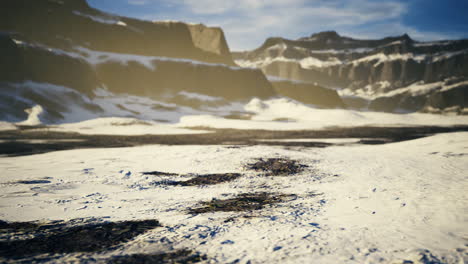 winter mountains with snow at sunrise create a stunning landscape