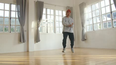 male breakdancer dancing, video in 4k 50fps