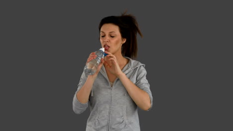 fit woman jogging to camera