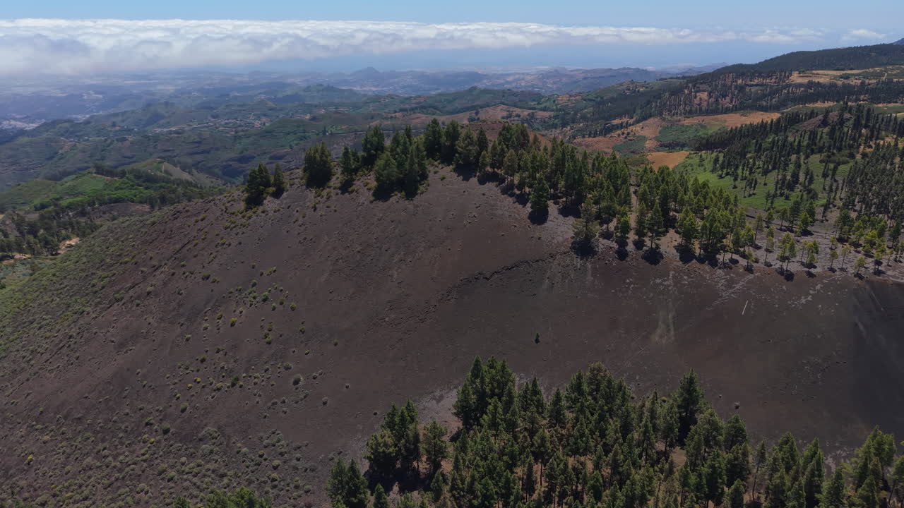 Volcanic landscape and lush vegetation of the black Mountain (Montañon Negro) in Gran Canaria, Canary Islands, Spain