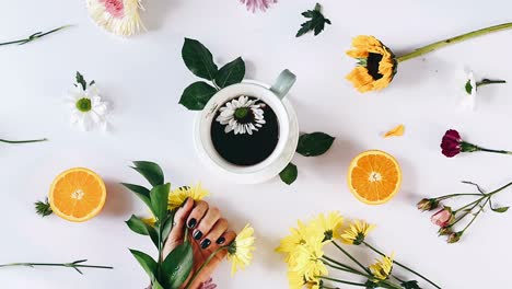 floral coffee arrangement with oranges