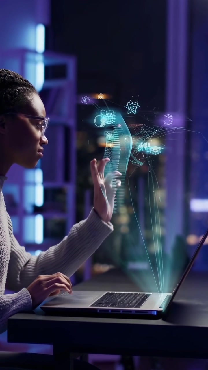 Young African American Woman Interacting with Holographic Science Display