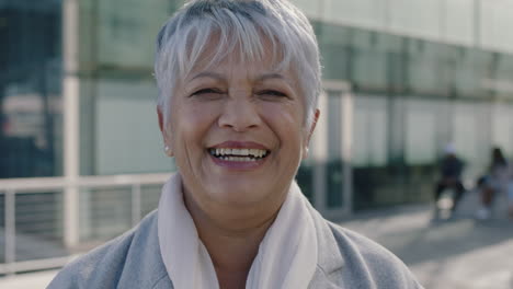 portrait of laughing indian business woman smiling happy corporate business