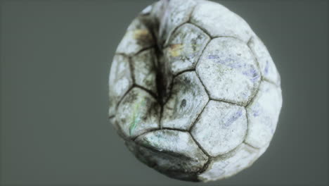 old deflated leather soccer ball