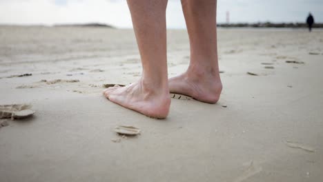 pair of adult legs repetitively being stretched