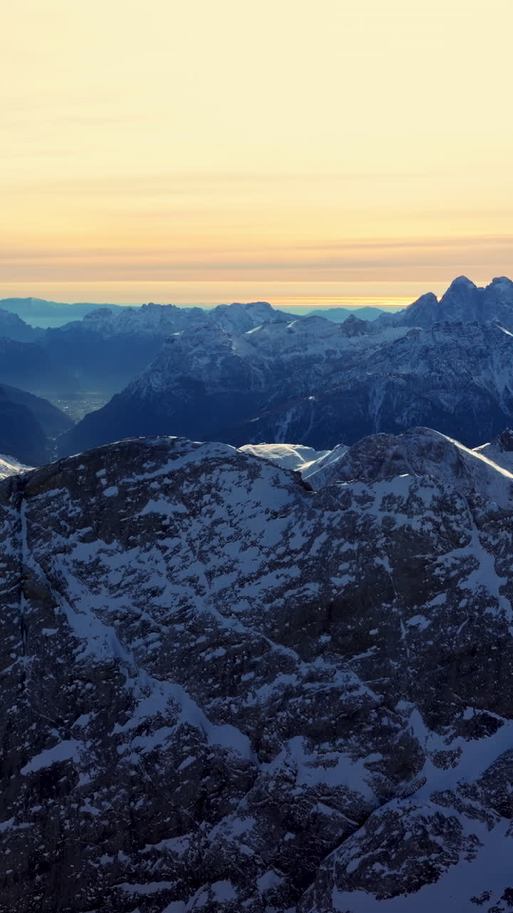 Aerial drone view of the Marmolada mountain in the Dolomites, northeastern Italy. Vertical
