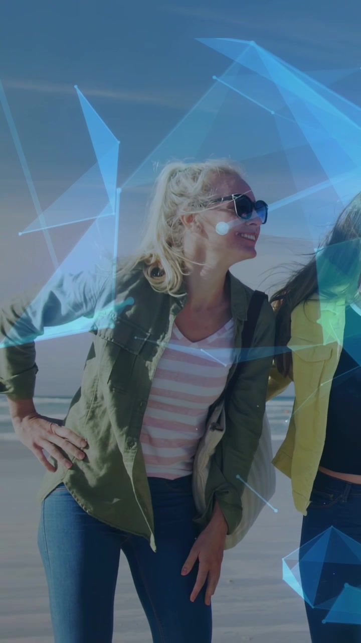 Vertical video: Woman shifting and stepping on beach, blue overlay framing hat for travel ad