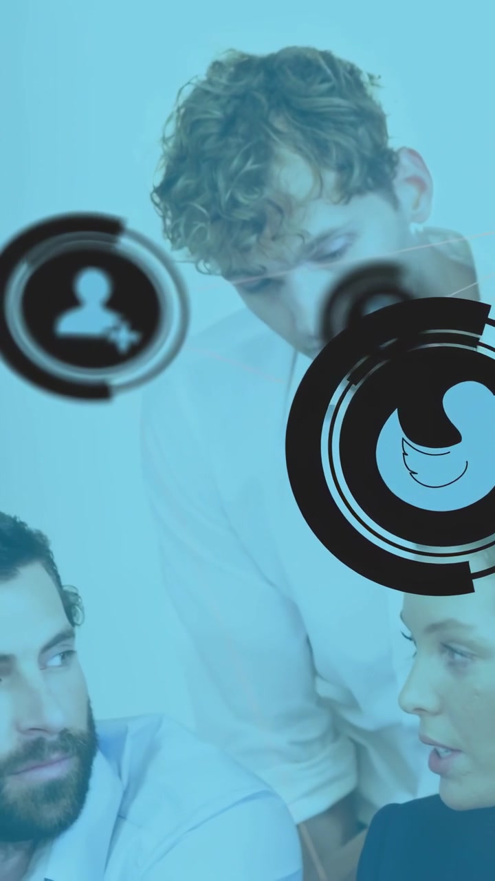 Vertical video: Woman in coat glancing at doc, talking while team leaning floating icons for review