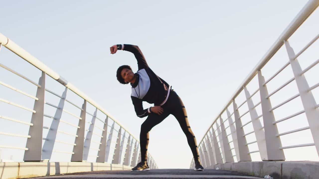 Man holding side stretch, THANK YOU graphic sliding in covering torso, fitness text appearing