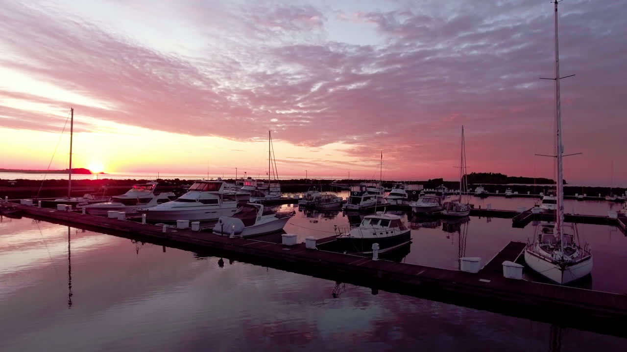 Beautiful sunrise on sailboat marina