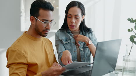 Laptop,-finance-and-couple-with-documents