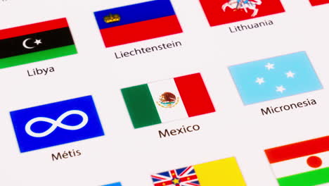 Zooming-out-on-a-close-of-a-picture-of-different-flags-of-the-world