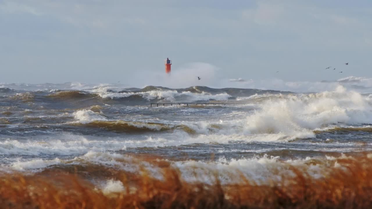 Footage captures Stormy Sea and stunning light reflections on waves near Riga.