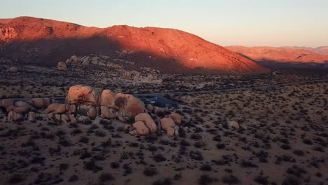 rising area of live oak picnic area in joshua tree national park at sunset, tourist destination