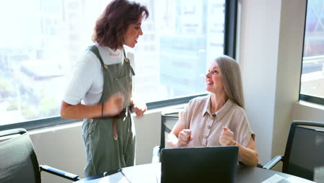 Success,-handshake-and-business-women