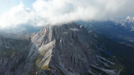 croda da lago peaks jut into clouds - scenic italian outdoors