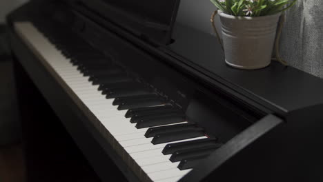 light passes by upright piano keys stylistic lighting