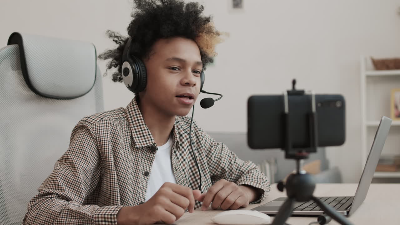 Teenage Blogger Talking on Smartphone Camera