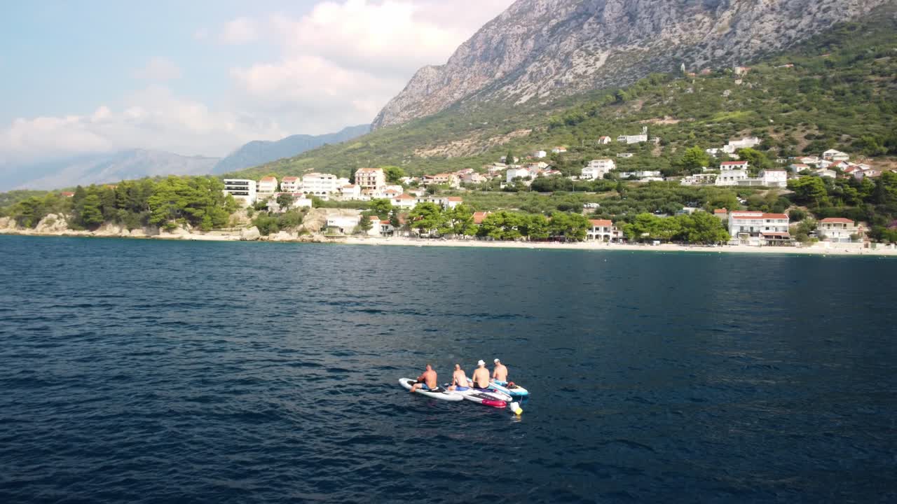 People Paddleboard Fishing In Croatia - Aerial Shot