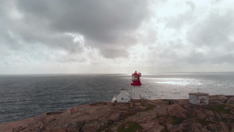 lindesnes lighthouse and north sea in norway. - aerial shot