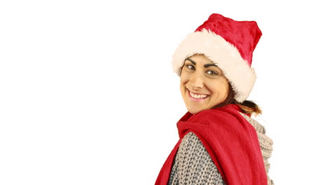 Chica-Con-Gorro-De-Papá-Noel-Y-Ropa-Abrigada-Soplando-Sobre-Las-Manos