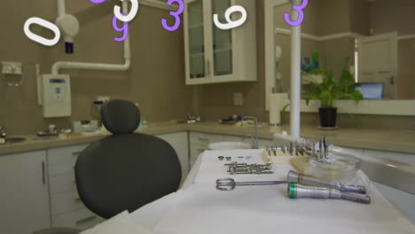 dental office with floating numbers animation over dental tools on counter