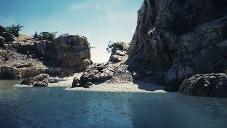 coastal view of a sand beach with cliffs