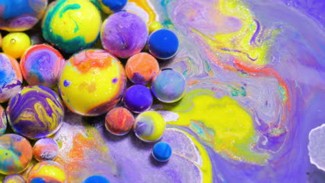 abstract colorful fluid art with marbling and spheres