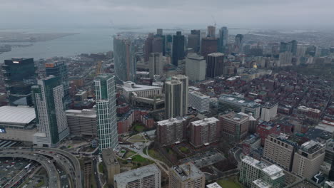 Fly-high-above-city.-Aerial-panoramic-view-of-contemporary-tall-business-buildings-in-centre.-Boston,-USA