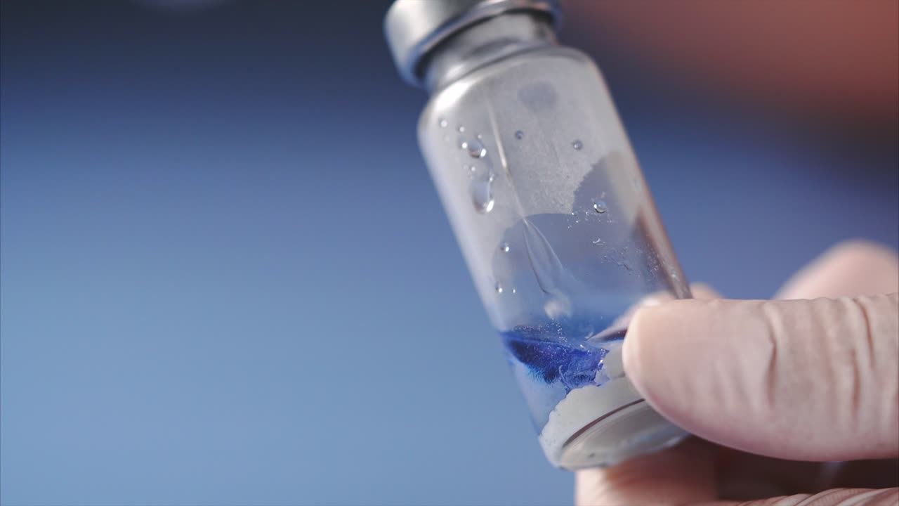 Medical Vial in Hand