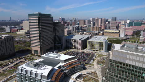 drone shot of houston tx medical center area buildings and hospitals on sunny day