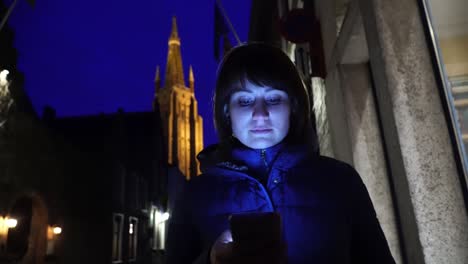 girl tourist walk on evening bruges belgium