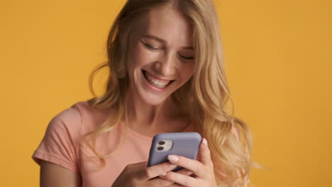 caucasian woman using smartphone.