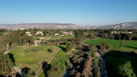 lash green during the winter- the jordan river- yardenit baptism holy christian site- religious tourism- northern israel