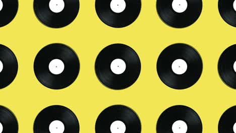 patrón geométrico de disco de vinilo retro en un fondo amarillo gráficos de movimiento simples animación musical