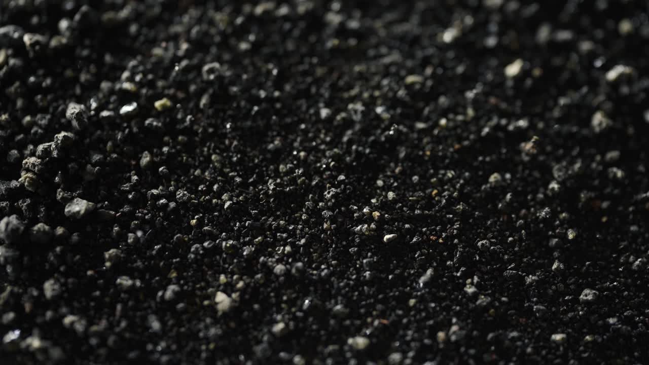 Macro Closeup Of Rocky Particles Moving In Magnetic Field