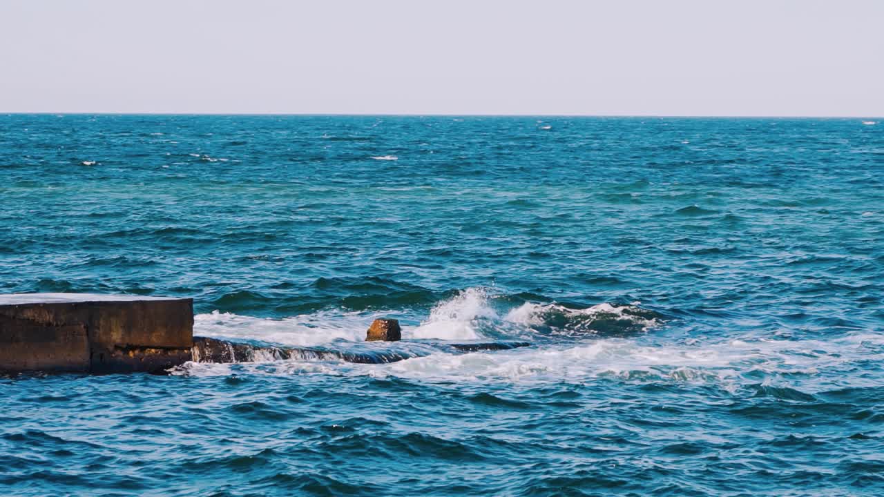 Wave ocean water background. Close up of dark blue waves of sea