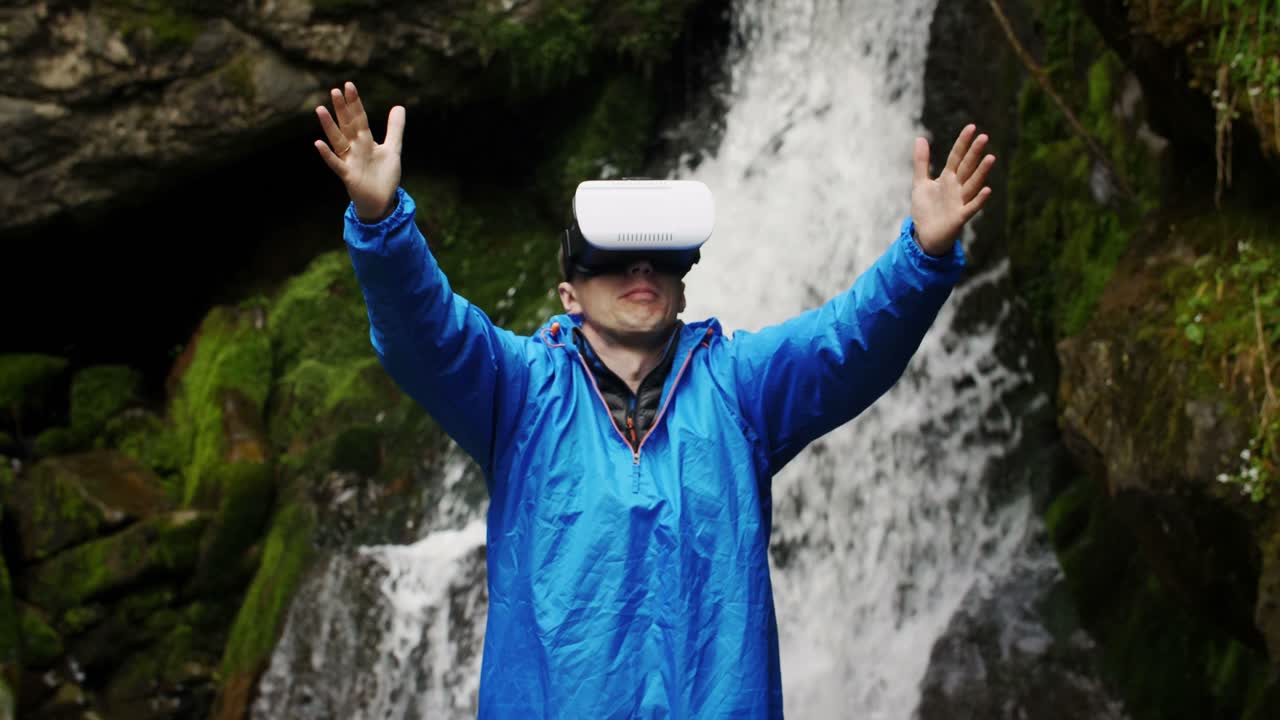 Man wearing VR headset experiencing nature