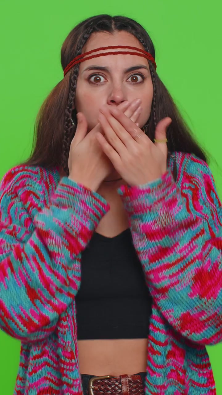 Frightened woman lady closing mouth with hands refusing to tell terrible secret unbelievable truth