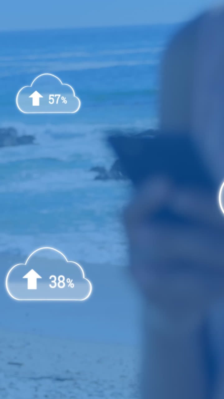 Animation of clouds with arrows and percent going up over caucasian woman using smartphone