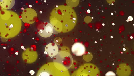 animación de manchas que caen sobre las bolas de navidad