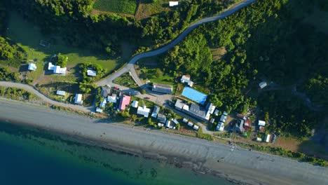 High-Aerial-Birdseye-Drone-Over-Dentif-Heritage-Church,-Lemuy-Island-Chile-Chiloe,-4K