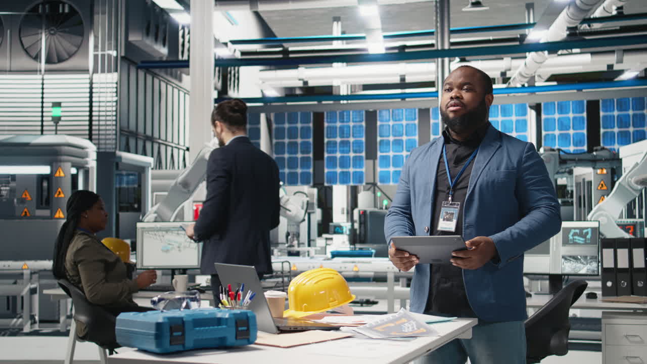 Engineers and Workers in a Manufacturing Factory