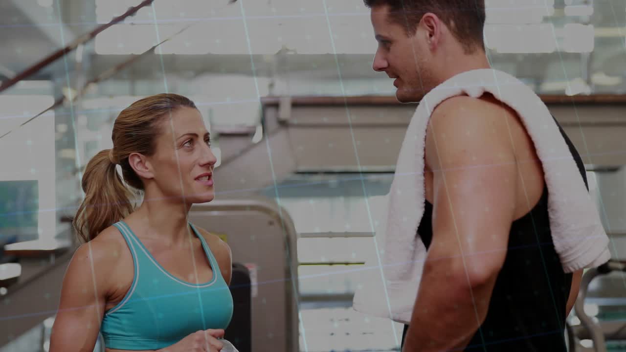 Woman speaking, gesturing bottle and starting chat in gym man listening as graphs crossing smiling